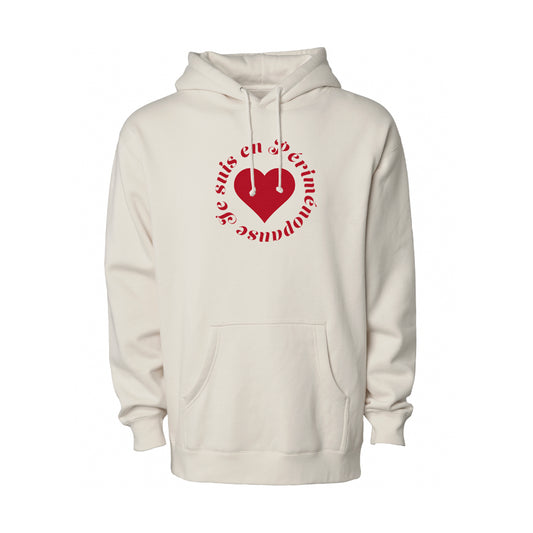 An off-white hooded sweatshirt with a red graphic on the chest featuring a heart and the French text 'JE SUIS EN PÉRIMÉNOPAUSE', displayed against a plain white background.