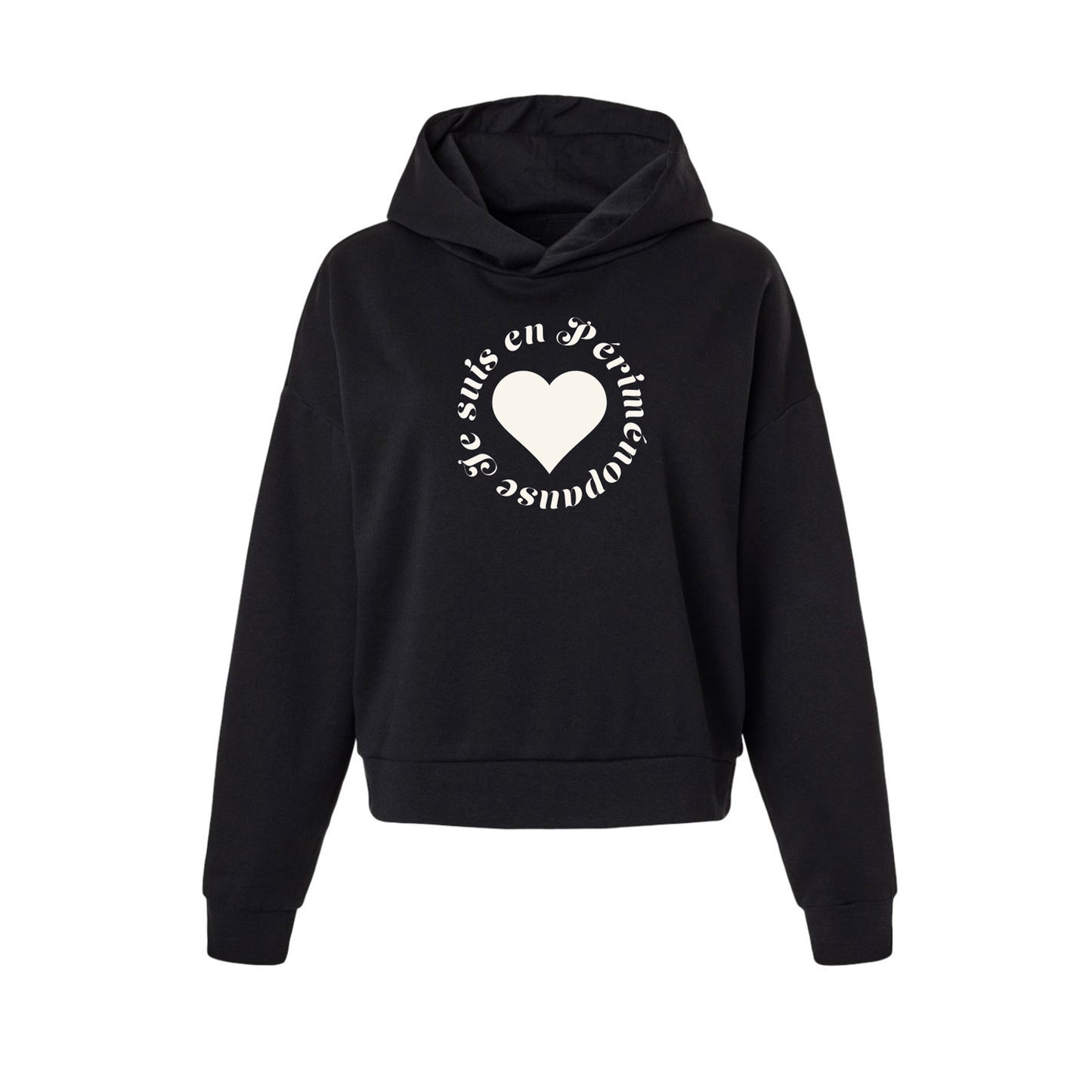 A black cropped pullover hoodie with a white graphic on the chest featuring a heart and circular text JE SUIS EN PÉRIMÉNOPAUSE, displayed on a solid white background.